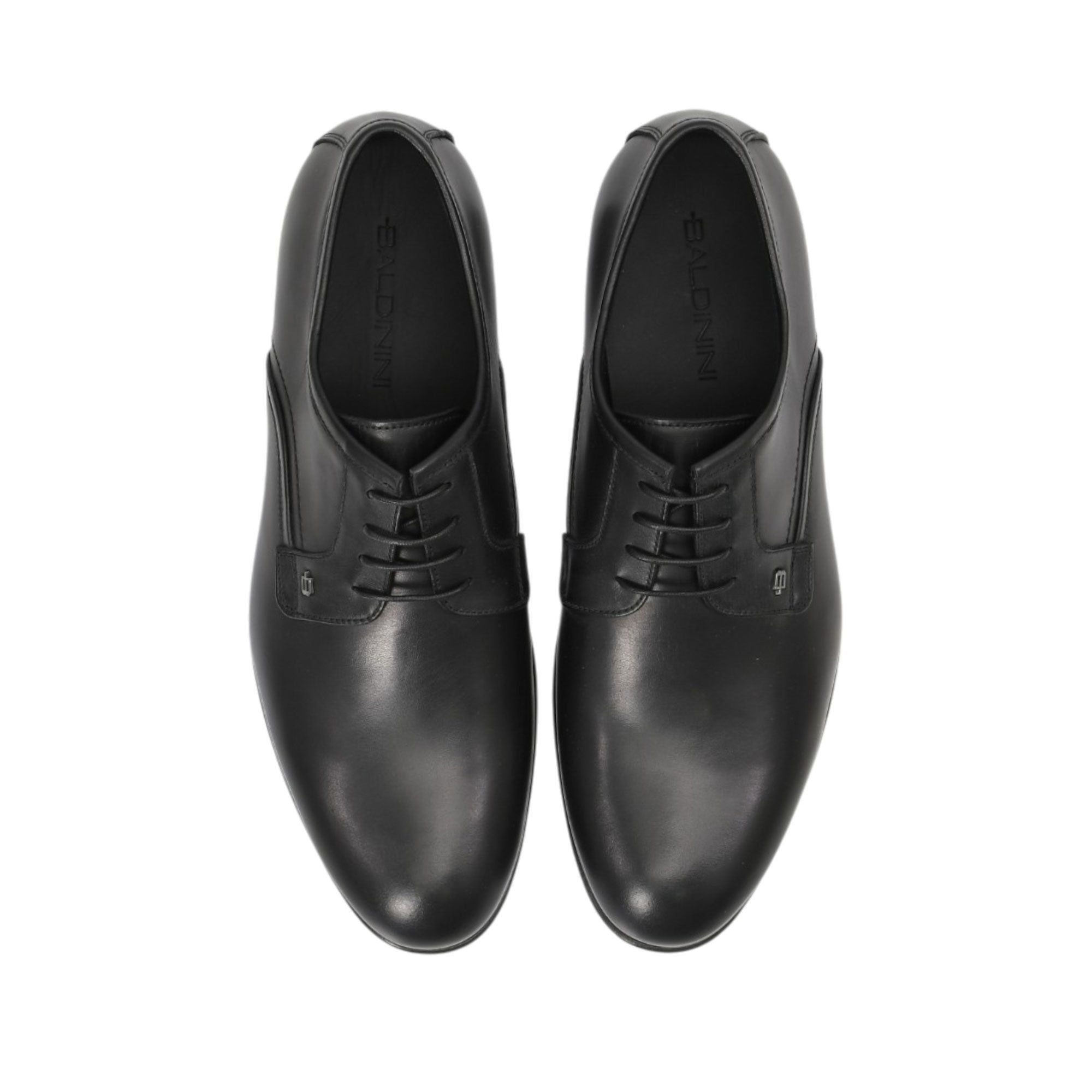 Direct top-down view of a pair of Baldinini dress shoes showing the black leather insoles cleanly debossed with the silver-toned Baldinini brand name and Made in Italy stamp against a white background.