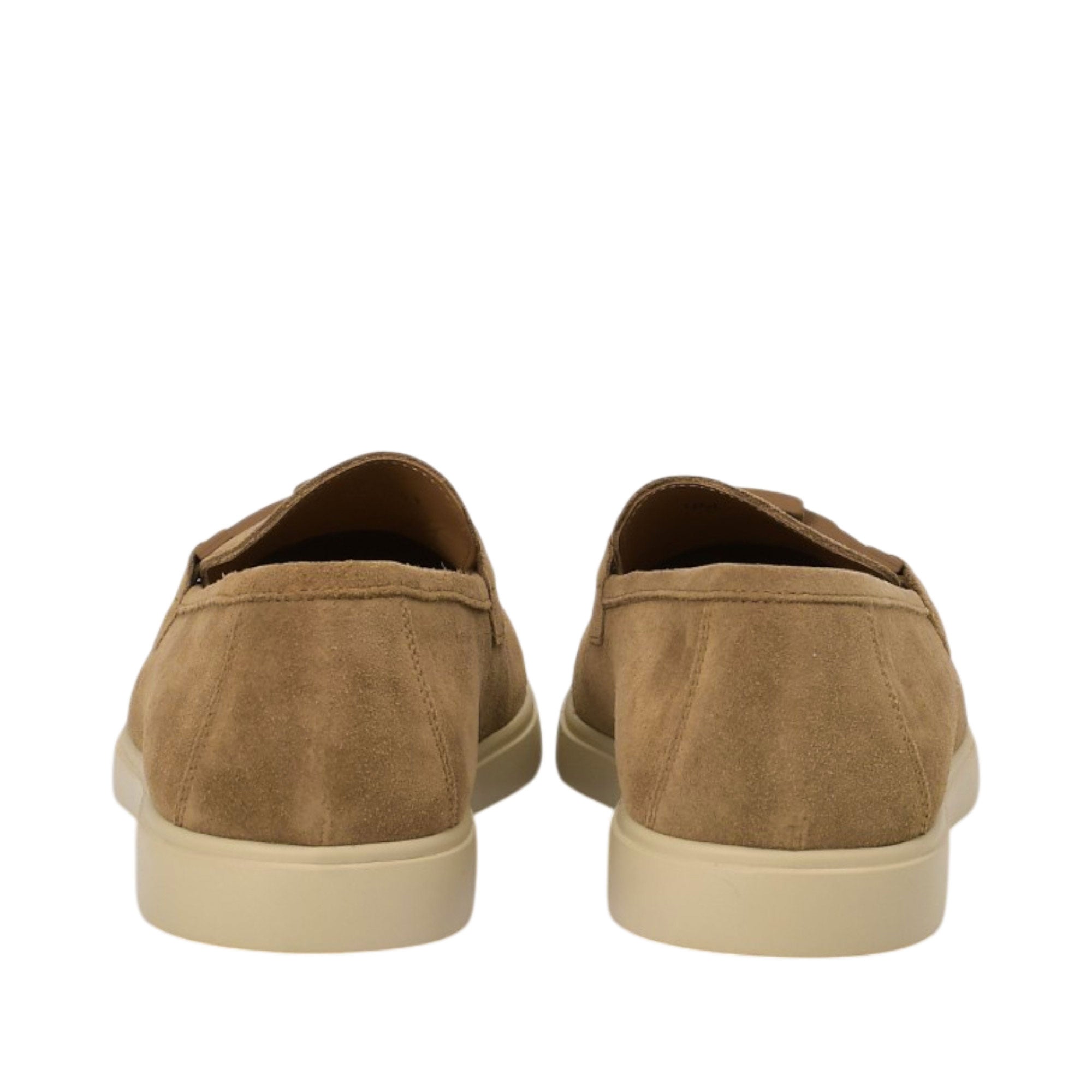 Rear view of a pair of Baldinini tan loafers displaying the clean suede heel counters with tonal stitched borders and the flat, solid beige rubber outsoles against a white background.