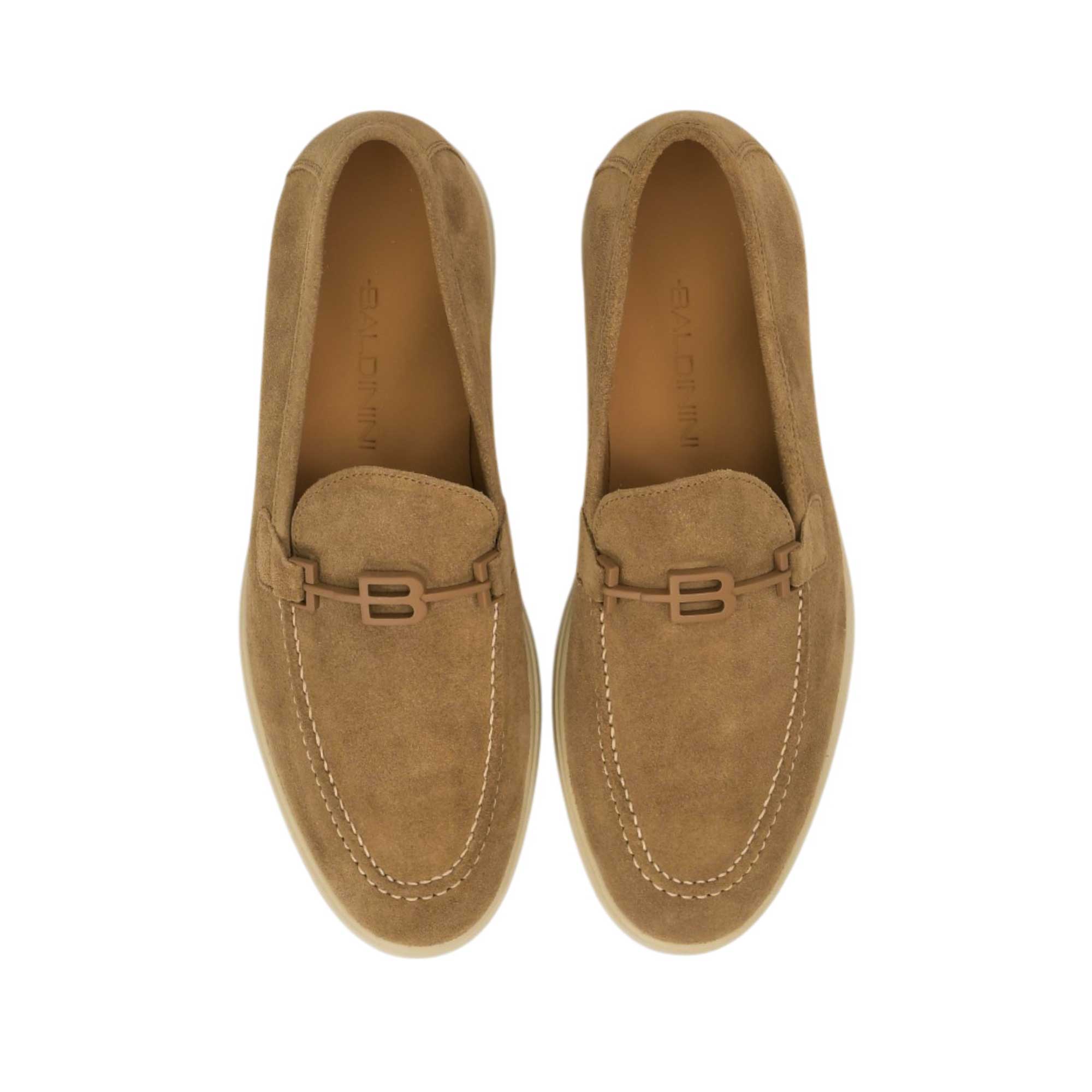 Direct top-down view of a pair of Baldinini loafers showing the tan leather insoles cleanly debossed with the dark Baldinini brand name signature against a white background.