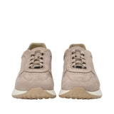 Front-facing view of a pair of Baldinini taupe sneakers highlighting the rounded toe boxes, subtle toe-box perforations, and elastic speed laces with matching metallic hardware against a white background.