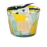 Front view of the Baobab Collection Riviera Santo Sospir scented candle in a glass jar with a yellow and green silk-screened design.