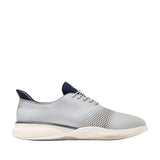 Light grey Cole Haan 6.ZERØGRAND Laser Quick-On Oxfords with perforated vamp, navy tongue, and ribbed off-white outsole.