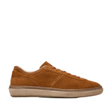 Brown suede low-top lace-up sneaker with a padded collar, visible stitching, and a contrasting light brown rubber sole.