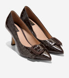 Pair of dark brown crocodile-embossed patent leather pointed-toe pumps with mid-height block heels and fabric-covered decorat