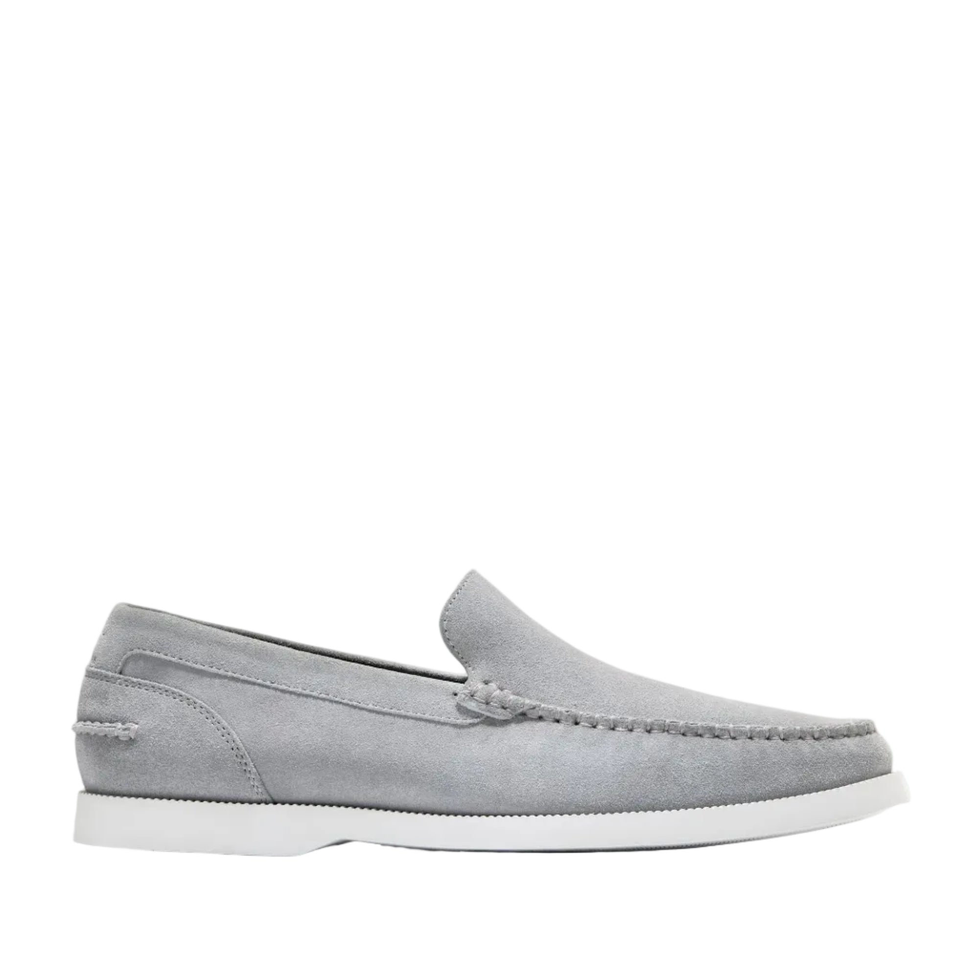 Light grey suede men's slip-on loafers with moc-toe stitching and a white rubber sole.