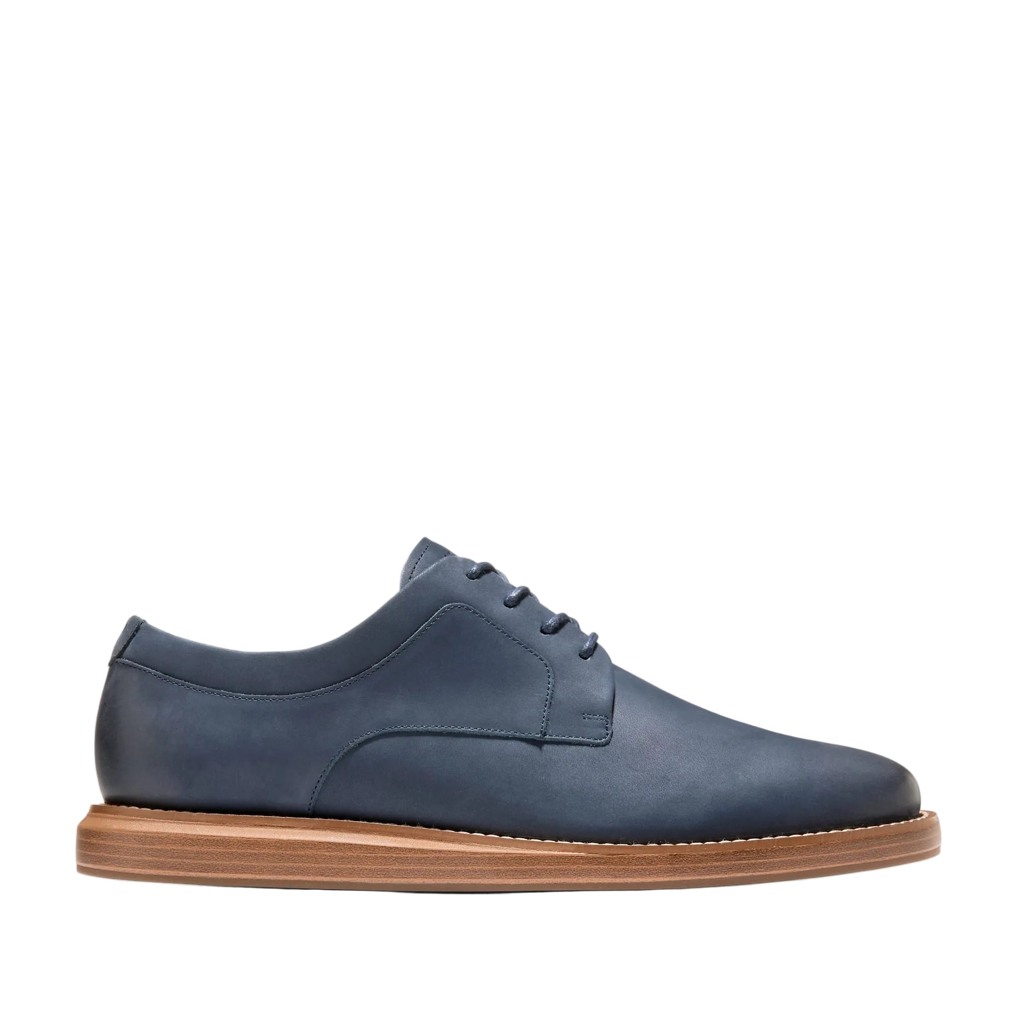 Navy blue plain toe oxford shoes with a matte nubuck upper and a light brown stacked sole.