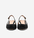 Pair of black suede slingback pumps with light tan inner soles featuring Cole Haan branding and gold-toned buckles.