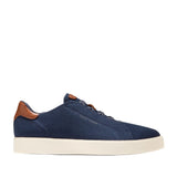 Navy blue Cole Haan men's slip-on knit sneakers with brown leather heel accents and a cream-coloured sole.
