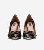 Pair of dark brown glossy crocodile-embossed leather pumps with pointed toes and a dark brown suede-like buckle strap across