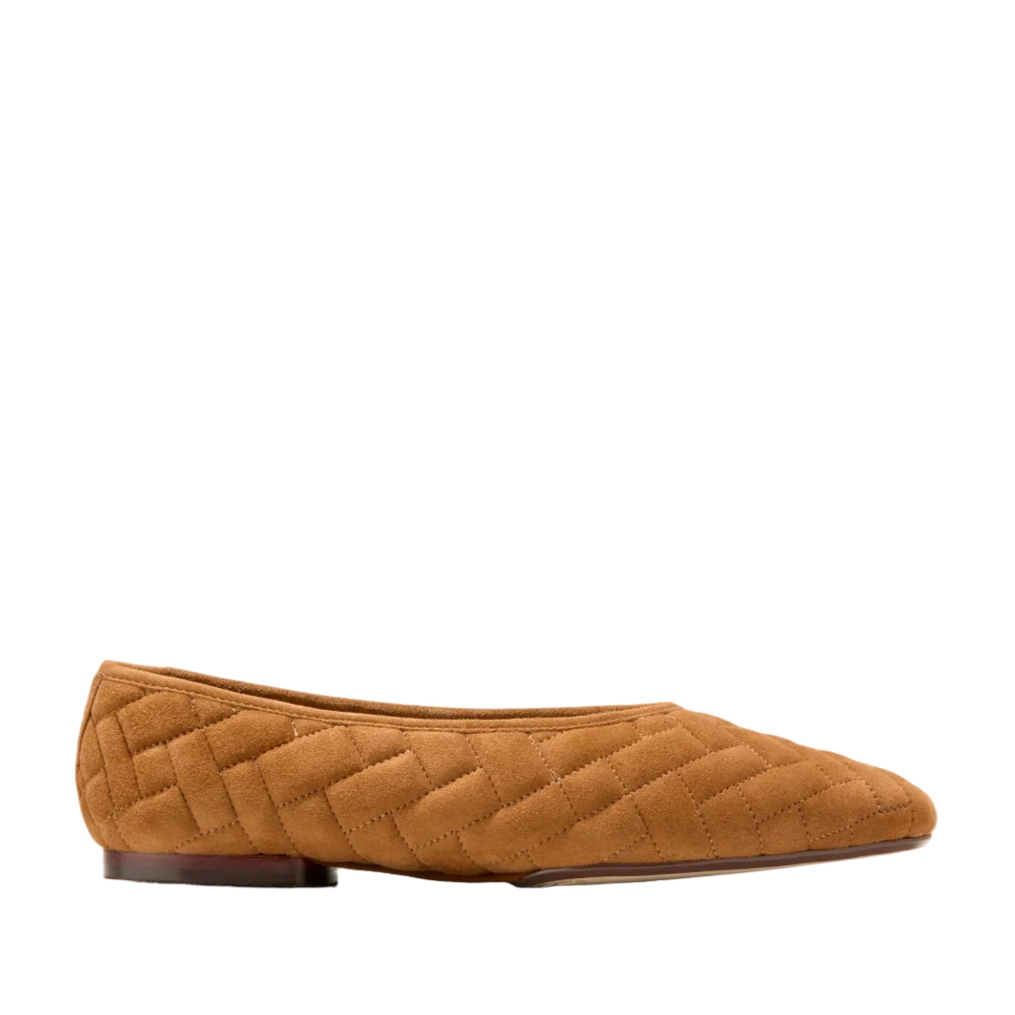 Tan suede quilted ballet flat with a pointed toe and low block heel, featuring diagonal stitching across the upper.