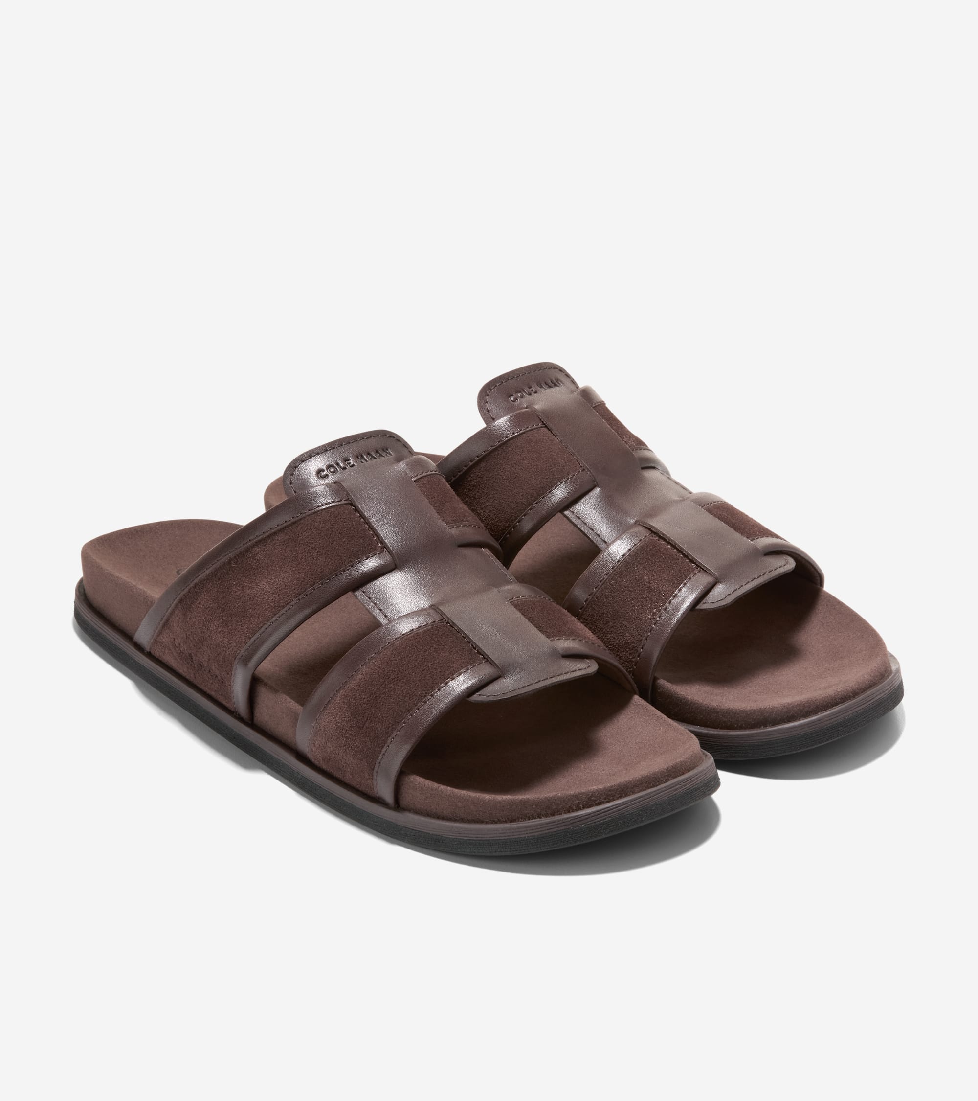 Pair of dark brown men's slip-on sandals with interlaced smooth leather and suede double bands across the foot, and a dark br