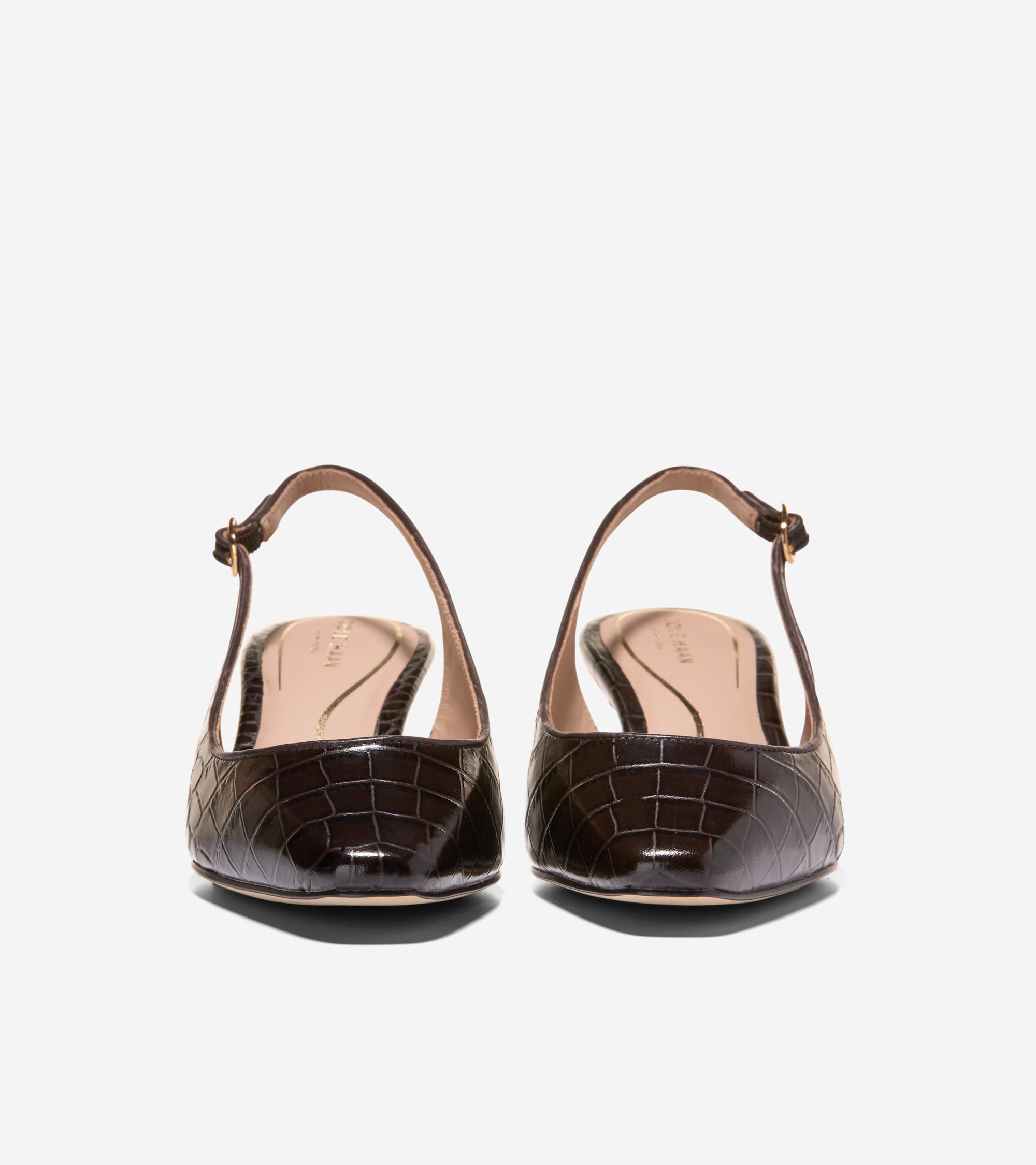 Pair of dark brown glossy crocodile-embossed slingback pumps with pointed toes and thin straps with gold-toned buckles.