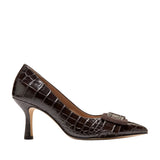 Dark brown glossy pump with crocodile-embossed texture, pointed toe, stiletto heel, and matte dark brown suede buckle.