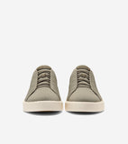 Pair of olive green knit slip-on sneakers with matching elastic laces and thick off-white soles. Cole Haan logo on right tong