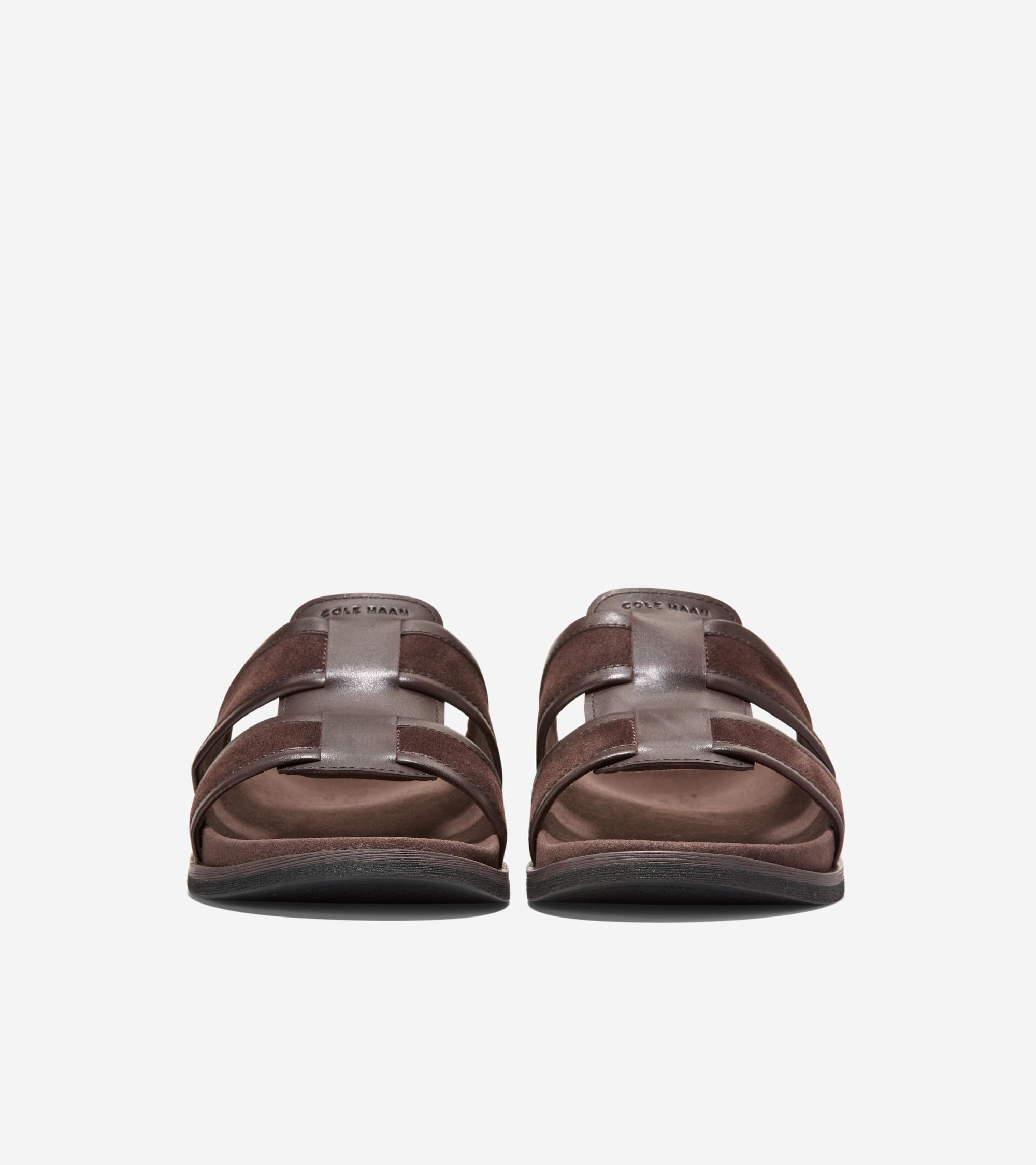 Pair of dark brown men's sandals with suede double bands and a central leather strap featuring the Cole Haan logo.