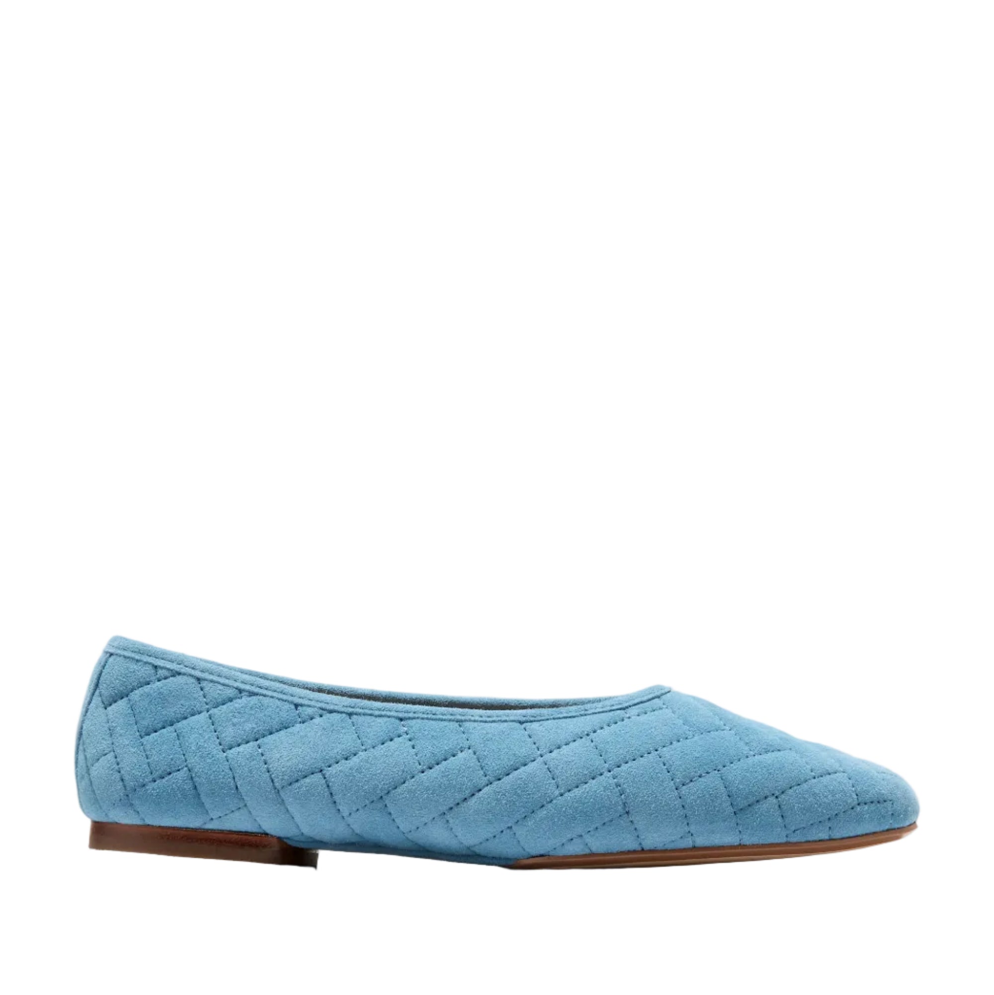 Light blue quilted suede ballet flat shoe with a rounded toe and low brown heel.