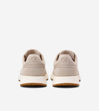 Pair of light beige suede slip-on sneakers with embossed 'CH' logo on the heel, thick cream soles, and brown gum outsoles.