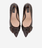 Pair of dark brown glossy crocodile-embossed pointed-toe pumps with dark brown suede-like buckle straps across the vamp.