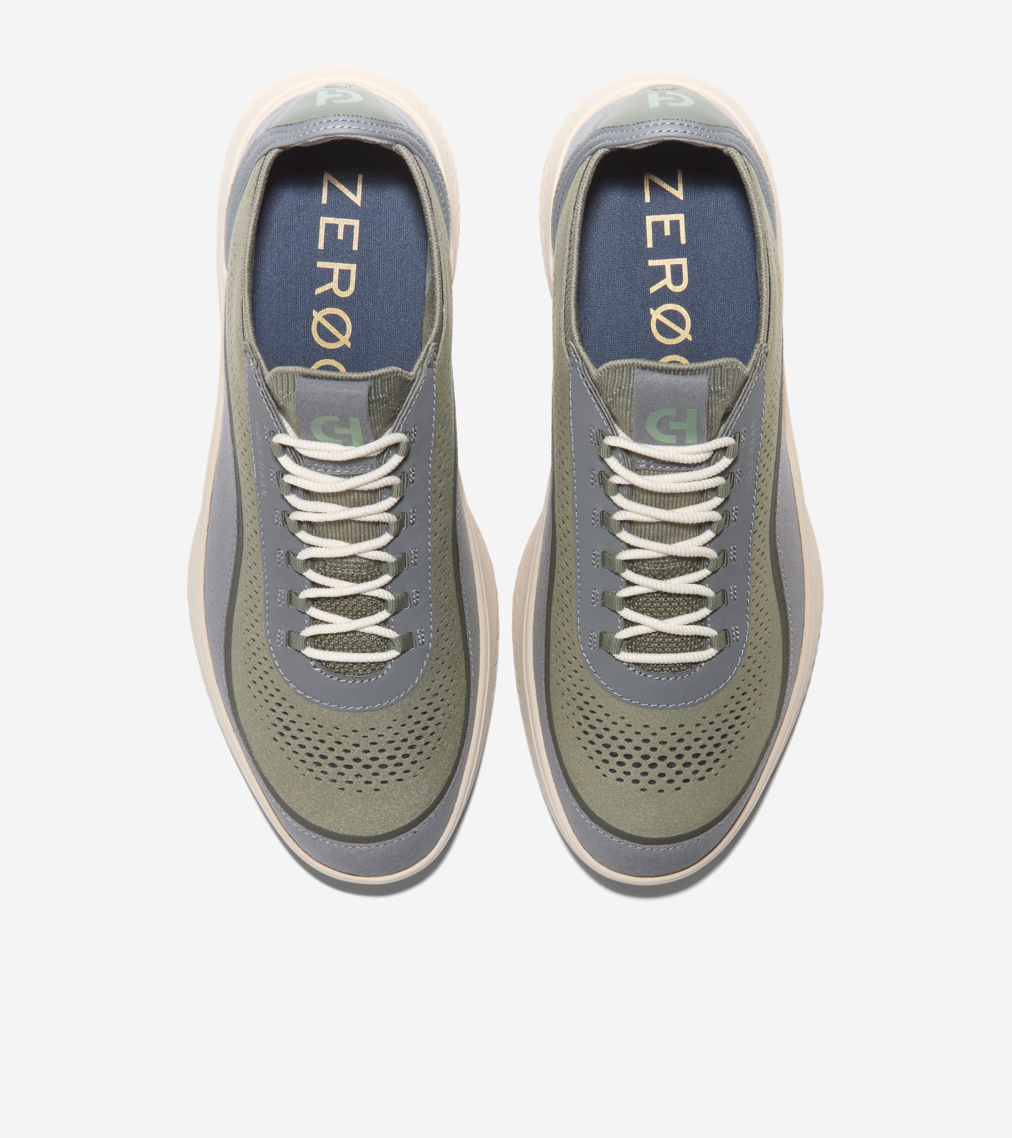 Olive green and grey mesh sneakers with off-white laces, cream soles, and dark blue insoles featuring 'ZERØGRAND' text.