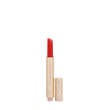 Bassam Fattouh Blind Date Plump and Pout slim gold lipstick tube opened to show the mauve pink lipstick shade, next to its gold cap.