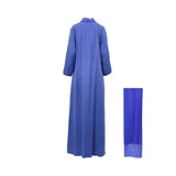 The back of a long, flowing blue abaya showing the simple, elegant drape of the fabric.