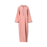 Front view of a Bazzah Couture rose pink Djellaba featuring tonal embroidery and a modest front hem slit.