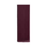 A close-up of a deep plum-colored sheer chiffon Sheila (headscarf) with a fine hem finish.
