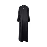 Rear view of the black inner dress showing the neck button and keyhole opening.