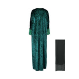 Back view of the emerald green velvet abaya showing the wide, draped bisht silhouette and textured fabric.