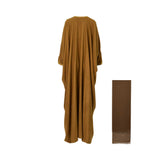 Back view of the mustard-brown bisht abaya showing the wide, flowing silhouette and embroidered shoulder accents