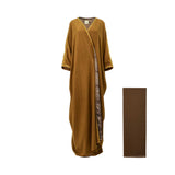 Front view of a mustard-brown Bazzah Couture bisht abaya featuring snakeskin print lapels and gold braided sleeve details, shown with a matching brown Sheila.