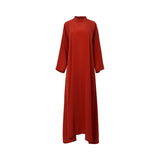 Front view of the rust-red, high-neck inner dress with long sleeves from Bazzah Couture.