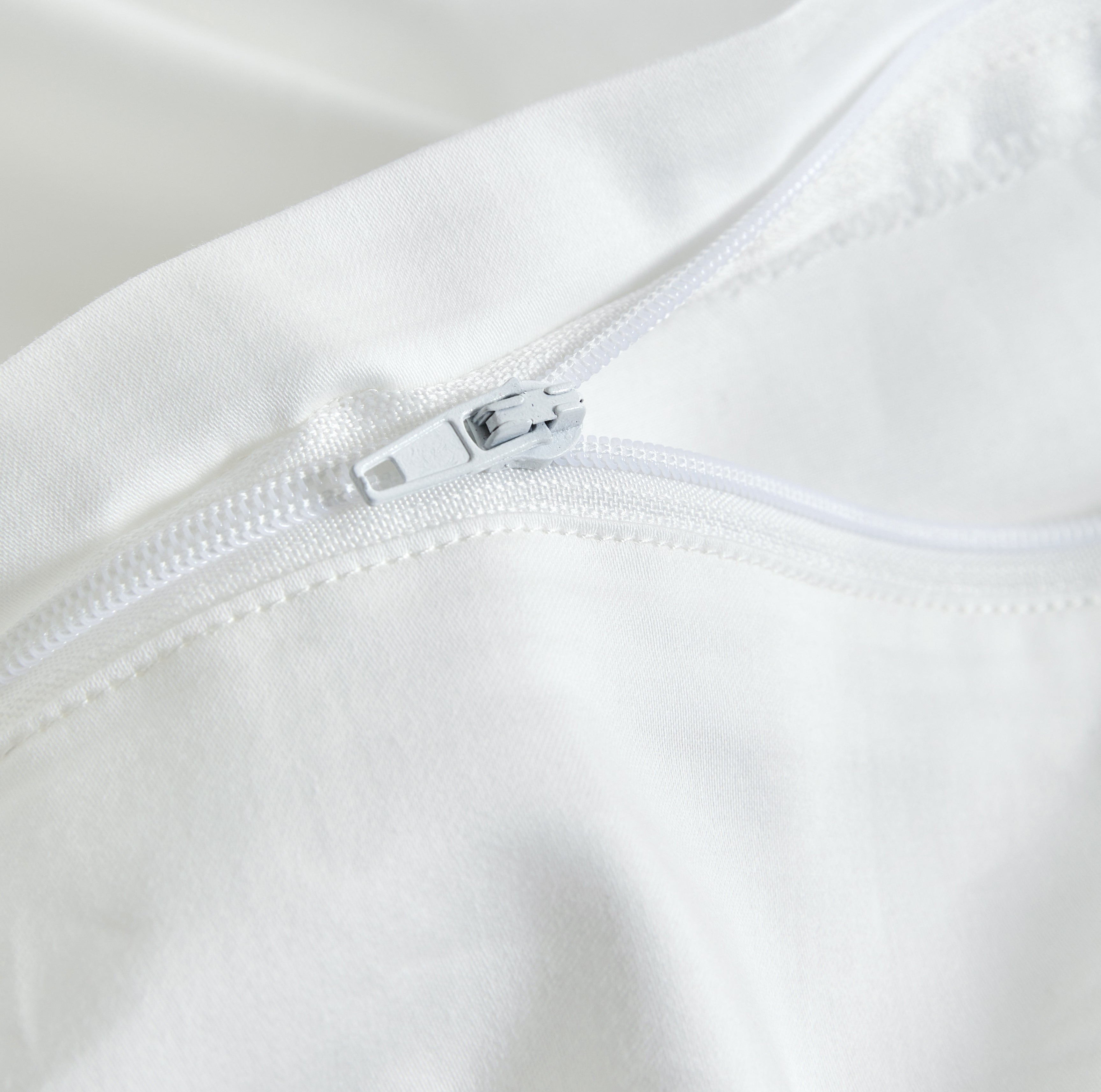 Equipped with a smooth-glide hidden zipper closure, ensuring a clean aesthetic and effortless duvet insertion.
