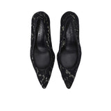 Top-down view looking into the Black Suede Studio pumps, showing the black leather insoles and the narrow pointed-toe shape.