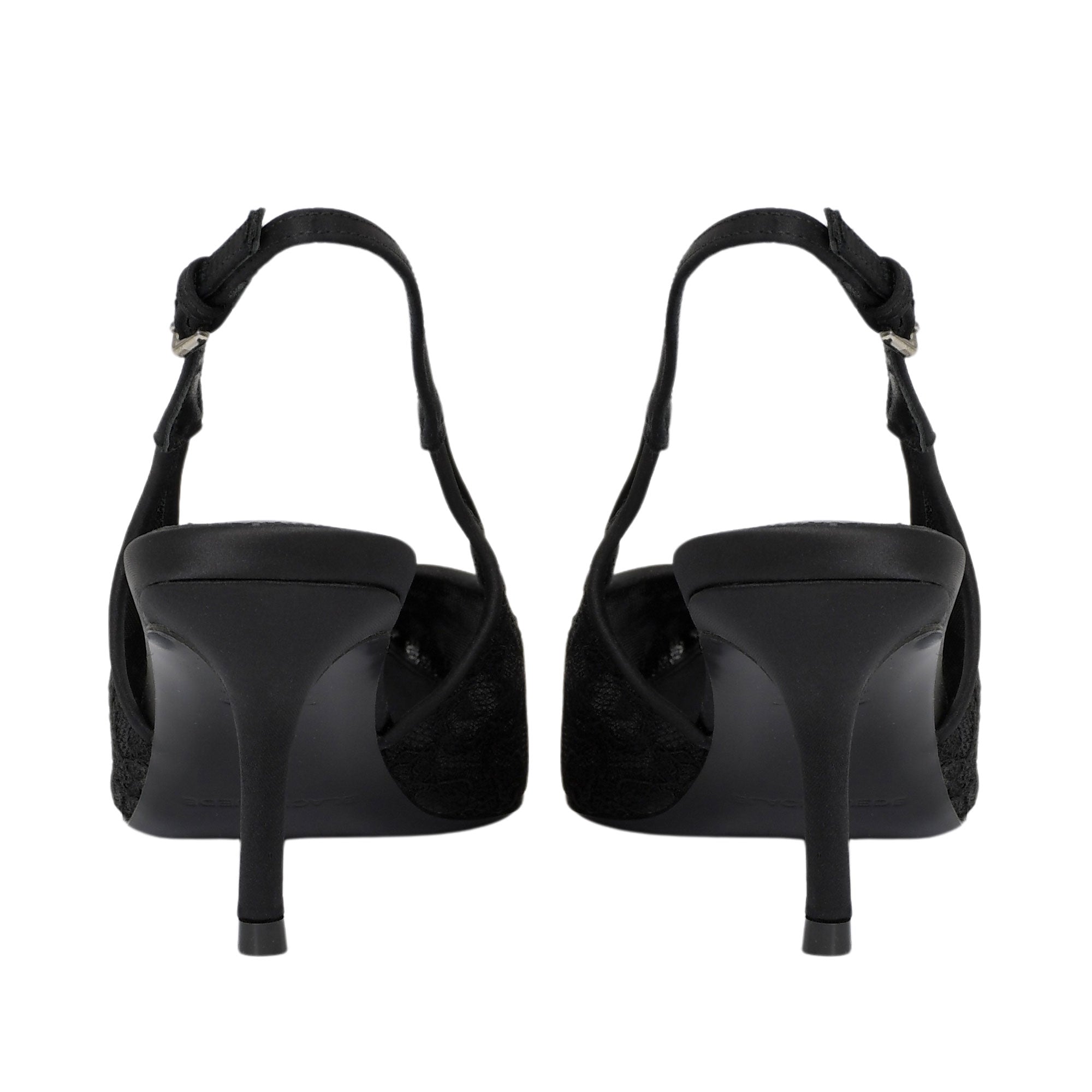 A pair of black slingback high-heeled sandals shown from the back, featuring a smooth black heel and sole with textured black fabric uppers and ankle straps, photographed on a solid white background.