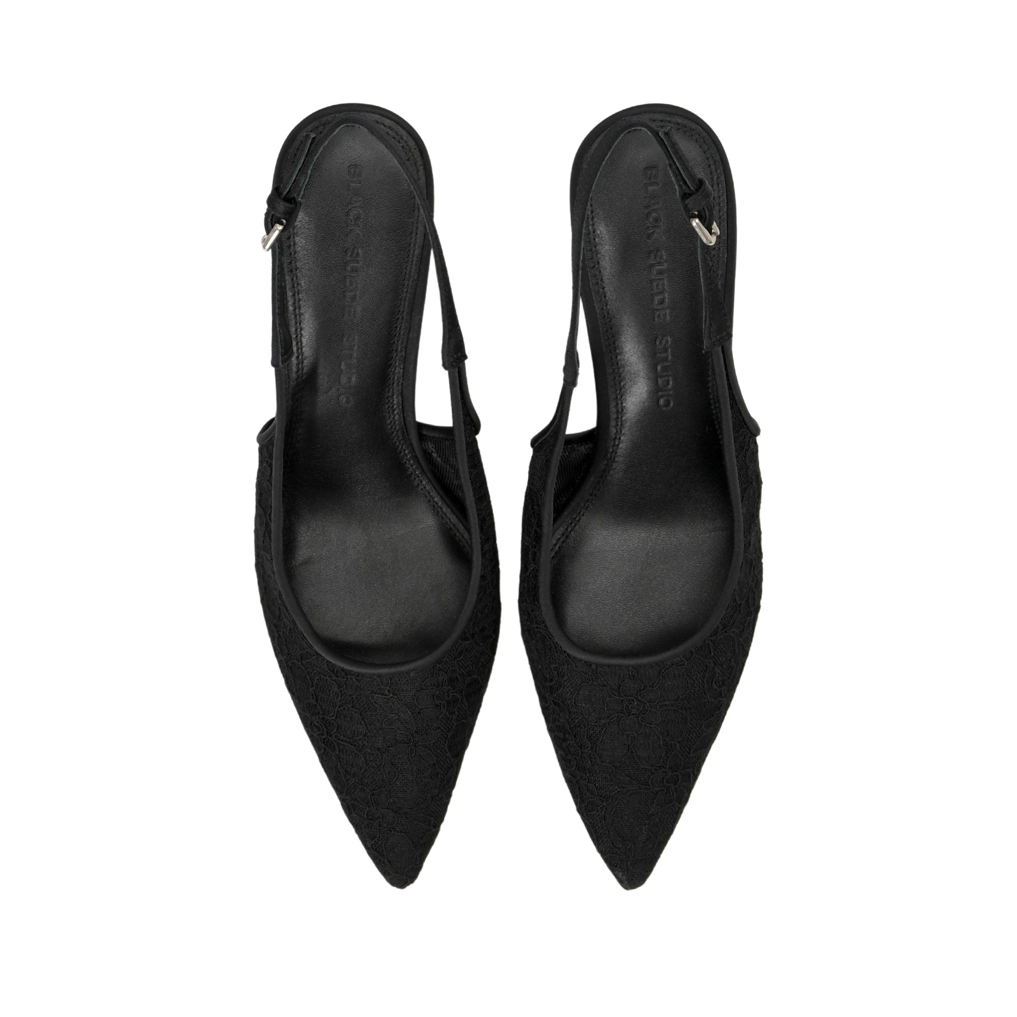 A pair of black pointed-toe slingback heels with a textured suede-like finish, shown from a top-down view on a plain white background.