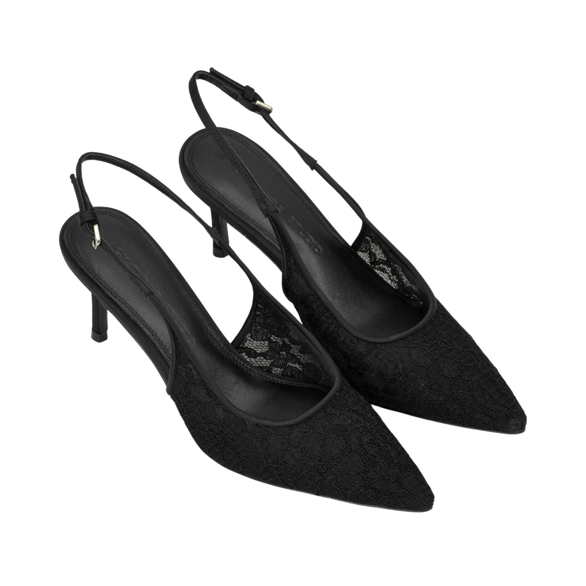 A pair of black pointed-toe slingback pumps with a textured lace overlay and a slim heel, shown on a plain white background.
