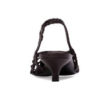 Rear view of the BLACK SUEDE STUDIO Maggie 35 woven leather slingback emphasizing the dark brown kitten heel and braided strap.