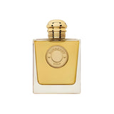 Gold Burberry perfume bottle on a white background.
