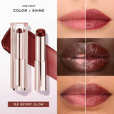 Two lipsticks: one capped with a clear ribbed cap and rose gold-toned base, one uncapped showing a deep berry glow stick.