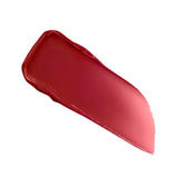 Rich red glossy lip product swatch, thicker and opaque at one end, tapering to a lighter, translucent red-pink.