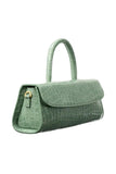 Side view of the BY FAR Mini Longa top handle bag in fresh green croco-embossed leather featuring an elongated rectangular shape and a single curved handle against a light grey background.