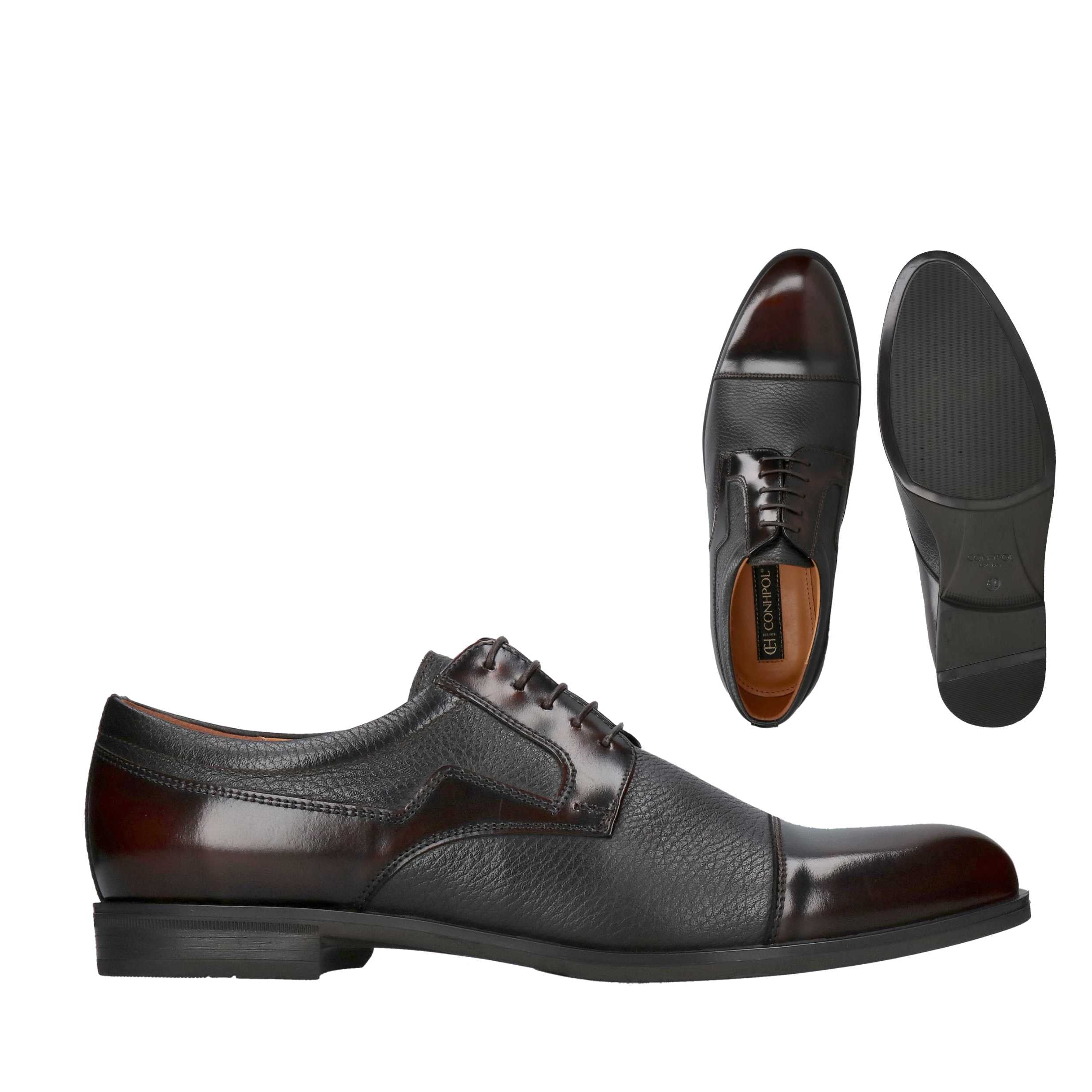 Brown leather cap-toe Oxford shoes. Shiny dark brown polished leather on toe, heel, and lacing, with textured dark brown leat