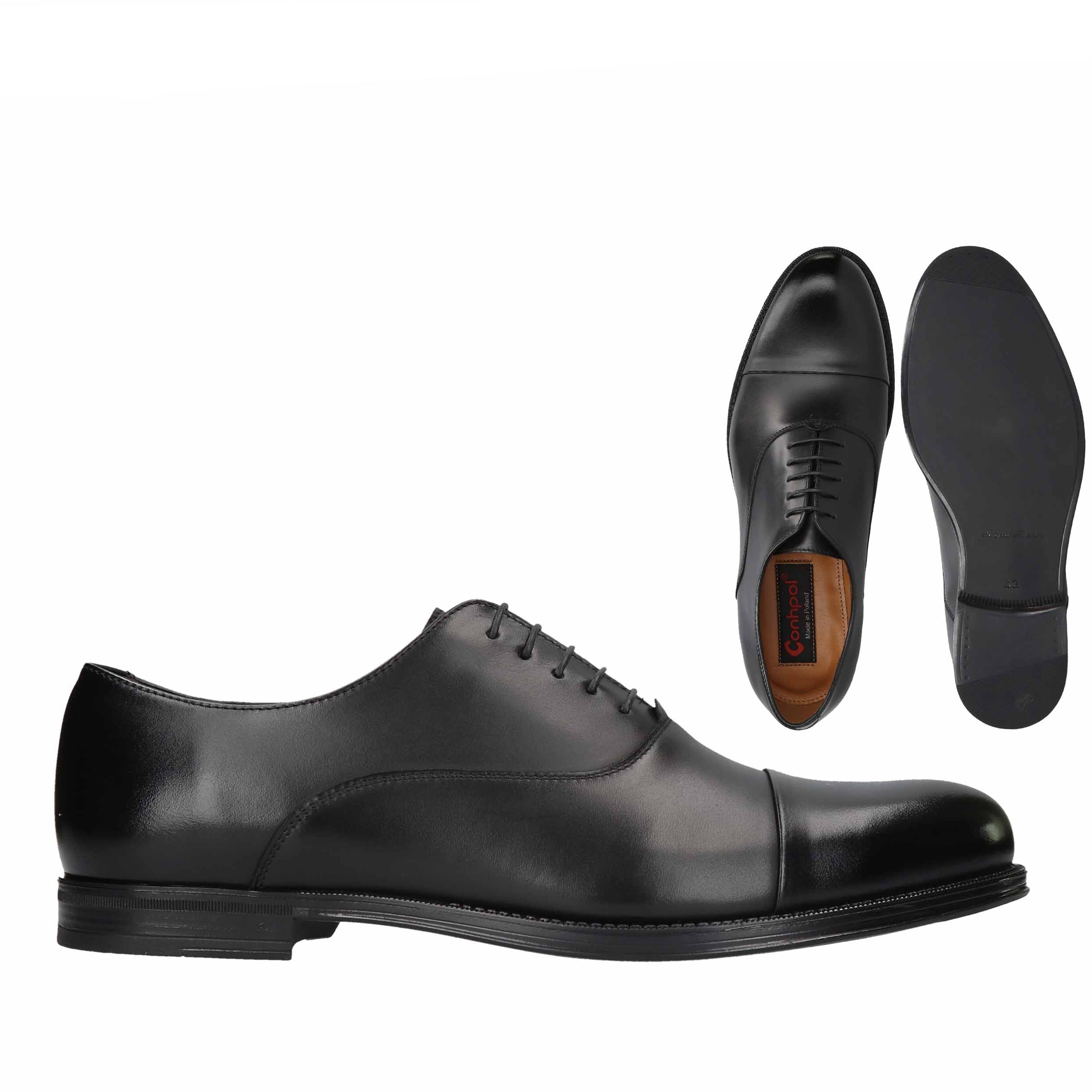 Black leather cap-toe Oxford shoes with black laces, a smooth finish, and black soles.