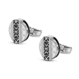 Pair of Saint Honore silver-toned cufflinks with black carbon fibre geometric pattern inlay and 'S' motif.