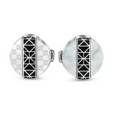 Silver-toned round cufflinks. One has monogrammed silver sides, the other white mother-of-pearl. Both with black geometric st