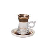 CASA BLU 13-piece luxury tea and coffee set featuring six gold-rimmed glass tea mugs with handles, six ceramic cawa cups, and one matching saucer arranged in a black foam-lined gift box.