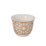 CASA BLU 13-piece host set with gold star lattice geometric patterns on smoked-glass tea cups and white porcelain cawa cups.