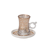 CASA BLU 13-piece host set with gold star lattice geometric patterns on smoked-glass tea cups and white porcelain cawa cups.