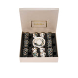 CASA BLU 13-piece tea and Arabic coffee set in a black foam-lined gift box. The set includes six glass tea cups and six porcelain coffee cups featuring a colorful green, red, and blue geometric mosaic pattern with gold accents.